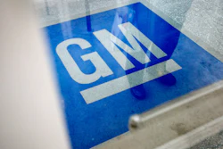 In this Jan. 10, 2013, file photo, the logo for General Motors decorates the entrance at the site of a GM information technology center in Roswell, Ga.
