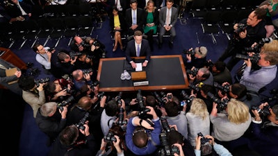 In this April 10, 2018, file photo, Facebook CEO Mark Zuckerberg arrives to testify on Capitol Hill in Washington.