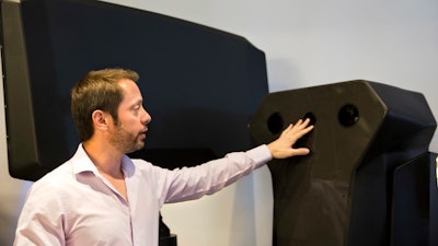 Skylock product manager Asaf Lebovitz explains their system's main unit at the company's offices in Petah Tikvah, Israel.