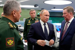 Defense Minister Sergei Shoigu, left, and President Vladimir Putin oversee the test launch of the Avangard hypersonic glide vehicle from Moscow.