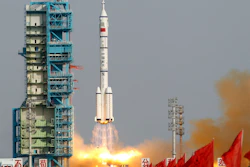 In this file photo taken Saturday, June 16, 2012, a Shenzhou 9 spacecraft Long March rocket launches from the Jiuquan Satellite Launch Center.