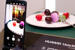 In this Jan. 6, 2018, file photo the Huawei Mate10 Pro phone is displayed at the Huawei booth during CES International in Las Vegas.