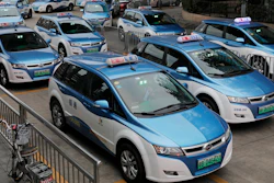 In this Monday, Jan. 7, 2019, photo, new electric-powered taxis are seen in Shenzhen city, south China's Guangdong province.