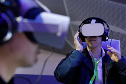 People use Oculus VR headsets at the Panasonic booth at CES International, Tuesday, Jan. 8, 2019, in Las Vegas.