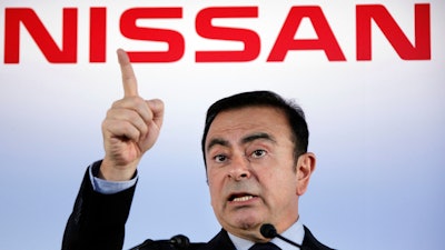 In this May 11, 2012, file photo, then Nissan Motor Co. President and CEO Carlos Ghosn speaks during a press conference in Yokohama.
