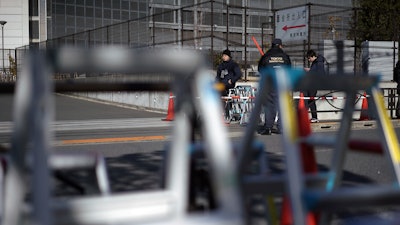 Step ladders placed by photographers and cameramen are seen in front of Tokyo Detention Center, where former Nissan chairman Carlos Ghosn is detained, Friday, Jan. 11, 2019.