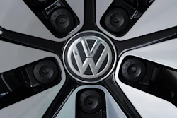 In this April 28, 2017 file photo an e-Golf electric car with the VW logo on a rim is pictured in Dresden.