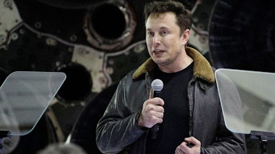 In this Sept. 17, 2018 file photo, SpaceX founder and chief executive Elon Musk speaks at an event in Hawthorne, Calif.