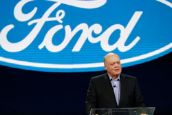 In this Jan. 14, 2018, file photo Ford President and CEO Jim Hackett prepares to address the media at the North American International Auto Show in Detroit.