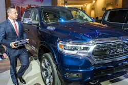 Reid Bigland, head of the Ram brand, walks next to the Ram 1500 pickup truck after it was awarded the 2019 North American Truck of the Year, Monday, Jan. 14, 2019.