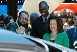 Pontus Fontaeus, executive design director of GAC Motors, tells Michigan Gov. Gretchen Whitmer and Lt. Gov. Garlin Gilchrist II the features of the company's concept vehicle, Tuesday, Jan. 15, 2019, at the North American International Auto Show in Detroit.