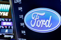 This April 23, 2018 photo shows the logo for Ford above a trading post on the floor of the New York Stock Exchange.
