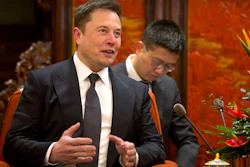 In this Jan. 9, 2019, file photo, Tesla CEO Elon Musk speaks during a meeting with Chinese Premier Li Keqiang at the Zhongnanhai leadership compound in Beijing.