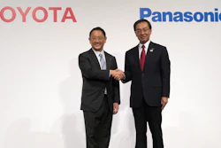 In this Dec. 13, 2017, file photo, Toyota President Akio Toyoda and Panasonic President Kazuhiro Tsuga pose after a press conference in Tokyo.