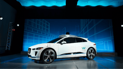 In this March 27, 2018 file photo, the Jaguar I-Pace vehicle outfitted with Waymo's suite of sensors and radar is introduced in New York.