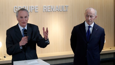 Renault chairman Jean-Dominique Senard, left, and CEO Thierry Bollore address the media after a board meeting held at Renault headquarters, Thursday, Jan. 24, 2019.