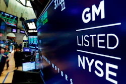 In this April 23, 2018, file photo, the logo for General Motors appears above a trading post on the floor of the New York Stock Exchange.