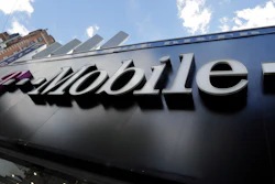 This Wednesday, Oct. 14, 2015, file photo shows a T-Mobile store in New York.