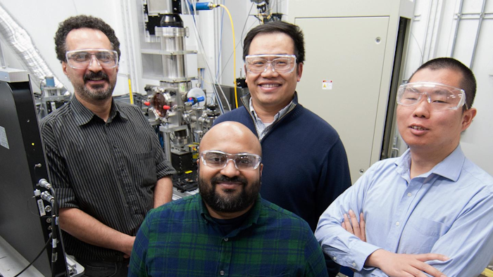 Co-authors of a paper about the 3D manufacturing process inside a hutch at Argonne's Advanced Photon Source. Pictured, clockwise from top left, are Kamel Fezzaa, an APS beamline scientist; Tao Sun, an APS beamline scientist; Cang Zhao, an APS postdoc, and Niranjan Parab, an APS postdoc.