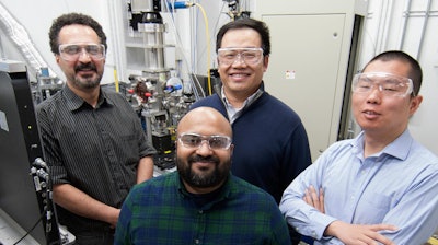 Co-authors of a paper about the 3D manufacturing process inside a hutch at Argonne's Advanced Photon Source. Pictured, clockwise from top left, are Kamel Fezzaa, an APS beamline scientist; Tao Sun, an APS beamline scientist; Cang Zhao, an APS postdoc, and Niranjan Parab, an APS postdoc.
