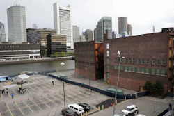 The Boston skyline forms a backdrop at the site of General Electric's new headquarters prior to a groundbreaking ceremony, Monday, May 8, 2017.