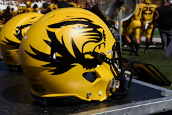 In this Sept. 22, 2018, file photo, a Missouri football helmet sits on the bench during the second half of a game against Georgia in Columbia, Mo.