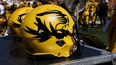 In this Sept. 22, 2018, file photo, a Missouri football helmet sits on the bench during the second half of a game against Georgia in Columbia, Mo.