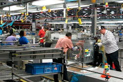 In this Thursday, Jan. 9, 2014, file photo, workers assemble ovens at the Electrolux home cooking appliance factory in Memphis, Tenn.