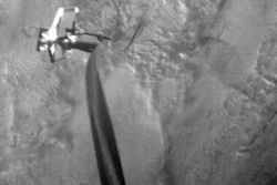 This Feb. 8, 2019, image shows a harpoon striking a square target mounted five feet from the RemoveDEBRIS spacecraft.