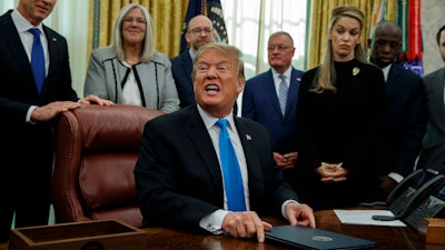 President Donald Trump speaks during a signing event for 'Space Policy Directive 4' in the Oval Office of the White House, Tuesday, Feb. 19, 2019.