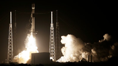 A SpaceX Falcon 9 rocket lifts off with Israel's Lunar Lander and an Indonesian communications satellite at space launch complex 40, Thursday, Feb. 21, 2019, in Cape Canaveral, Fla.