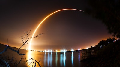 This photo shows a time exposure of the launch of the SpaceX Falcon 9 rocket from Cape Canaveral, Fla., Thursday, Feb. 21, 2019.