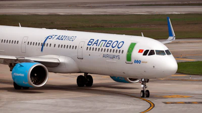 In this Feb. 19, 2019, photo, a Bamboo Airways airplane taxis on the tarmac at Noi Bai airport in Hanoi.