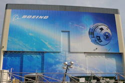 A CST-100 Starliner depicted on Boeing’s facility at Kennedy Space Center, Fla.