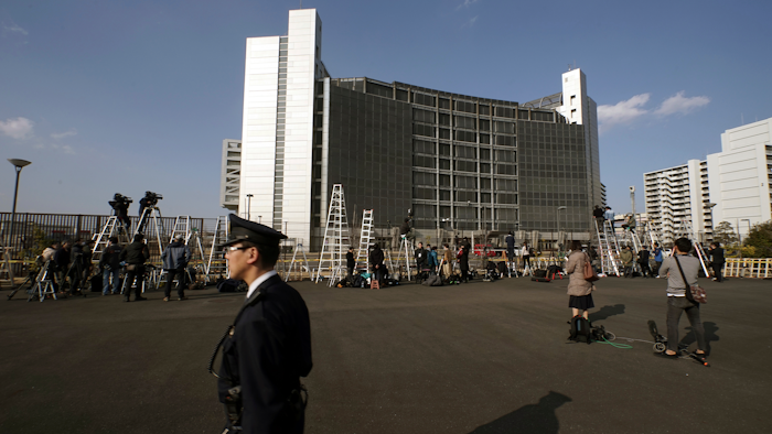 Step ladders placed by photographers and cameramen are seen in front of Tokyo Detention Center, where former Nissan Chairman Carlos Ghosn is detained, Tuesday, March 5, 2019, in Tokyo.