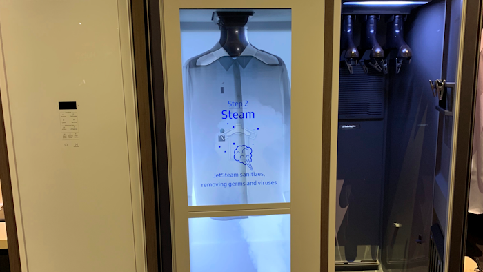 This Feb. 23, 2019, photo shows steam blowing into an AirDresser by Samsung at the Design and Construction Week show in Las Vegas.