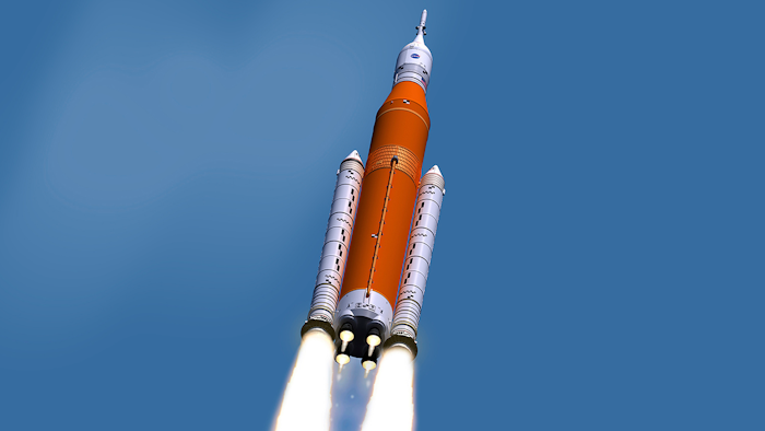 This illustration made available by NASA shows the Space Launch System during liftoff. On Wednesday, March 13, 2019, NASA's top official said the space agency's new rocket won't be ready for a moon shot next year.