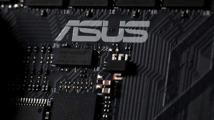 This Feb. 23, 2019, photo shows the inside of a computer with the ASUS logo in Jersey City, N.J.
