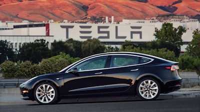 This undated image shows the Tesla Model 3 sedan.