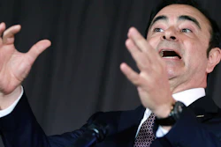 In this May 12, 2016, photo, then-Nissan Motor Co. President and CEO Carlos Ghosn speaks during a press conference in Yokohama.