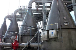 In this Feb. 21, 2019, photo, four cone-shaped machines designed to mix oxygen into river water and inject it back into the Savannah River stand on the shore of the waterway in Savannah, Ga.