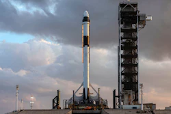In this Jan. 3, 2019 photo, the SpaceX Falcon 9 rocket and Crew Dragon spacecraft is rolled out for a dry run at NASA's Kennedy Space Center in Florida.