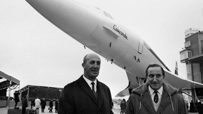 In this Dec. 11, 1967, file photo, test pilots Andre Turcat and Brian Trubshaw stand in front of the prototype of the jet during its roll out ceremony in Toulouse.