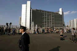 Step ladders placed by photographers and cameramen are seen in front of Tokyo Detention Center, where former Nissan Chairman Carlos Ghosn is detained, Tuesday, March 5, 2019, in Tokyo.