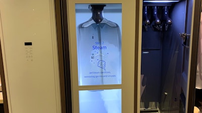 This Feb. 23, 2019, photo shows steam blowing into an AirDresser by Samsung at the Design and Construction Week show in Las Vegas.