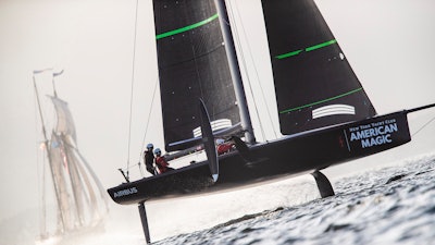In a photo provided by New York Yacht Club's American Magic, American Magic's test boat knowns as the Mule undergoes training Feb. 23, 2019, at Pensacola, Fla. American Magic is the only one of the seven teams for the 2021 America's Cup that has built the closest thing allowed by the rules to what the actual race boat, the AC75, will look and perform like. American Magic is building its first AC75 in Rhode Island and expects it to be finished by the middle of the summer.