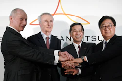 Renault CEO Thierry Bollore, Renault Chairman Jean-Dominique Senard, Nissan CEO Hiroto Saikawa and Mitsubishi Motors Chairman and CEO Osamu Masuko pose after their press conference in Yokohama, Tuesday, March 12, 2019.