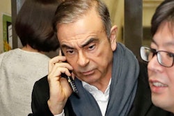 In this March 12, 2019, photo, former Nissan Chairman Carlos Ghosn leaves his lawyer's office in Tokyo.