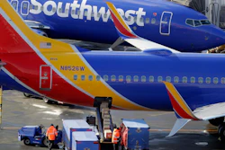 In this Feb. 5, 2019, file photo, Southwest Airlines planes are loaded at Seattle-Tacoma International Airport.