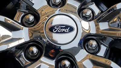 In this Feb. 14, 2019, file photo, a wheel on a 2019 Ford Expedition 4x4 is displayed at the 2019 Pittsburgh International Auto Show.